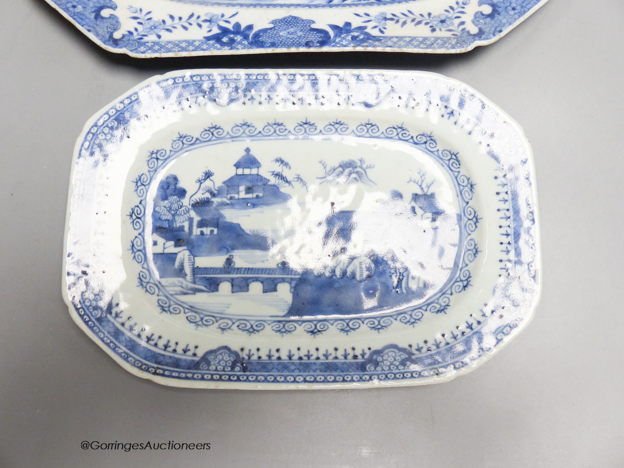 Two 18th century Chinese circular export plates and two canted rectangular dishes, 32 x 23cm